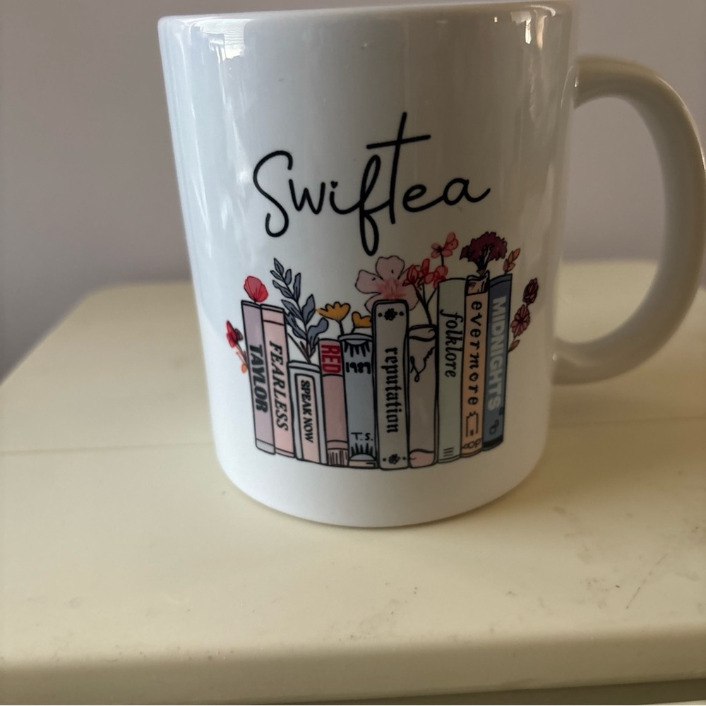 Taylor Swift White Mug with Colorful Book Design